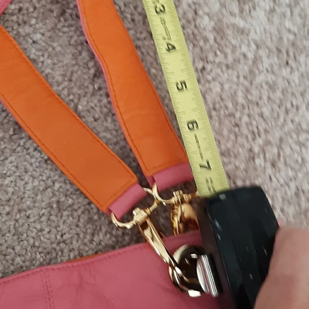 Pink and orange leathershoulder handbag